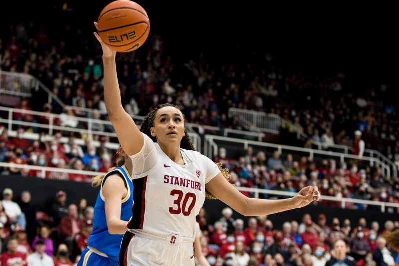 Feb 20, 2023; Stanford, California, USA;  Stanford Cardinal guard Haley Jones (30) gets possession against the UCLA Bruins during the first half at Maples Pavilion. Mandatory Credit: John Hefti-USA TODAY Sports