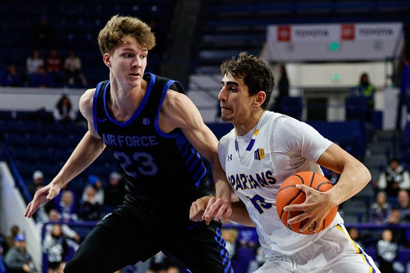 Jan 13, 2024; Colorado Springs, Colorado, USA; San Jose State Spartans guard Alvaro Cardenas (13) drives to the net against Air Force Falcons guard Kellan Boylan (23) in the second half at Clune Arena. Mandatory Credit: Isaiah J. Downing-USA TODAY Sports