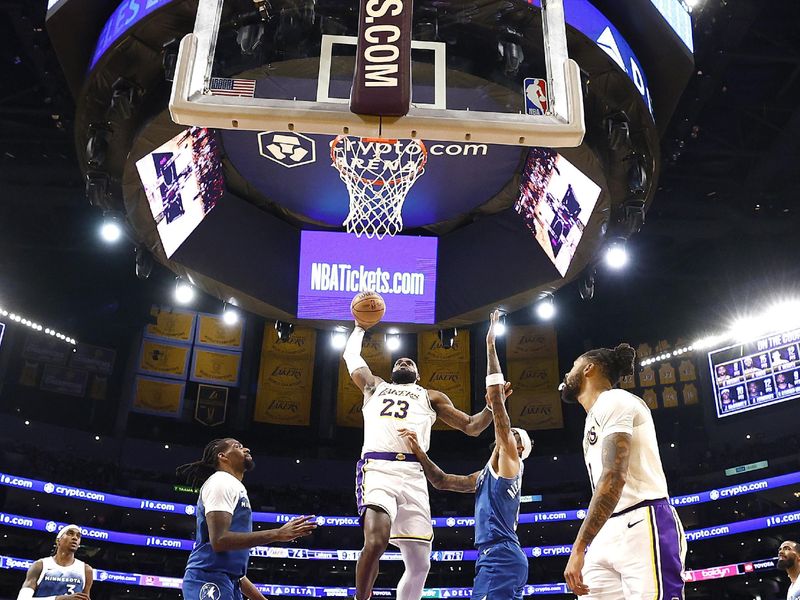 LOS ANGELES, CALIFORNIA - MARCH 10:  LeBron James #23 of the Los Angeles Lakers makes a slam dunk against the Minnesota Timberwolves in the second half at Crypto.com Arena on March 10, 2024 in Los Angeles, California.  NOTE TO USER: User expressly acknowledges and agrees that, by downloading and/or using this photograph, user is consenting to the terms and conditions of the Getty Images License Agreement.  (Photo by Ronald Martinez/Getty Images)