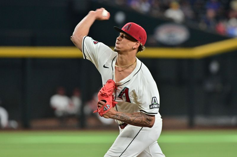 Apr 17, 2024; Phoenix, Arizona, USA; Arizona Diamondbacks pitcher Justin Martinez (63) throws in the ninth inning against the Chicago Cubs at Chase Field. Mandatory Credit: Matt Kartozian-USA TODAY Sports