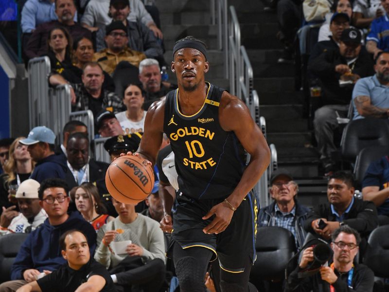 SAN FRANCISCO, CA - FEBRUARY 25: Jimmy Butler #10 of the Golden State Warriors dribbles the ball during the game against the Charlotte Hornets on February 25, 2025 at Chase Center in San Francisco, California. NOTE TO USER: User expressly acknowledges and agrees that, by downloading and or using this photograph, user is consenting to the terms and conditions of Getty Images License Agreement. Mandatory Copyright Notice: Copyright 2025 NBAE (Photo by Noah Graham/NBAE via Getty Images)