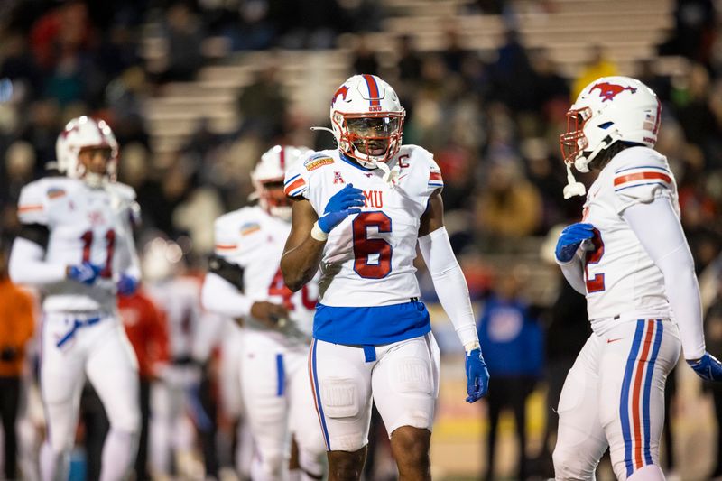 Dec 17, 2022; Albuquerque, New Mexico, USA; Southern Methodist Mustangs linebacker Jimmy Phillips Jr. (6) talks to a teammate while facing the Brigham Young Cougars during the first half at University Stadium (Albuquerque). Mandatory Credit: Ivan Pierre Aguirre-USA TODAY Sports