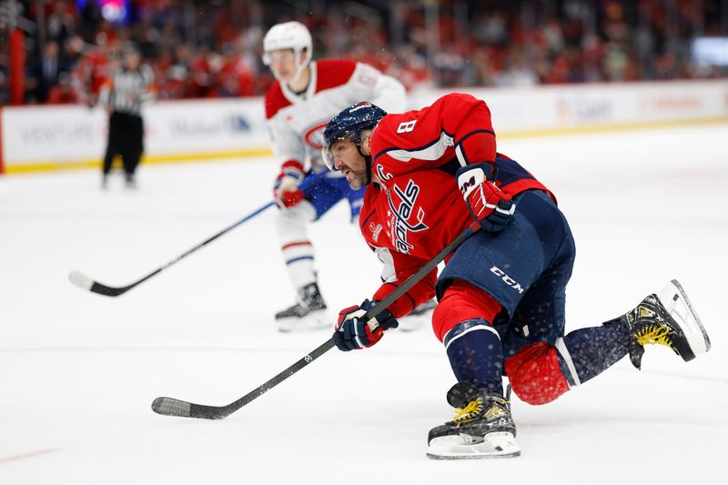 Oct 31, 2024; Washington, District of Columbia, USA; Washington Capitals left wing Alex Ovechkin (8) shoots the puck against the Montreal Canadiens in the third period at Capital One Arena. Mandatory Credit: Geoff Burke-Imagn Images