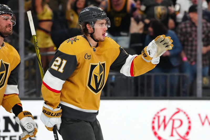 Mar 19, 2024; Las Vegas, Nevada, USA; Vegas Golden Knights center Brett Howden (21) celebrates after scoring a goal against the Tampa Bay Lightning during the second period at T-Mobile Arena. Mandatory Credit: Stephen R. Sylvanie-USA TODAY Sports