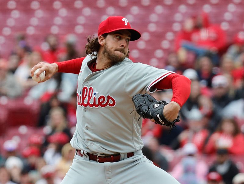 Apr 16, 2023; Cincinnati, Ohio, USA; Philadelphia Phillies starting pitcher Aaron Nola (27) throws against the Cincinnati Reds during the first inning at Great American Ball Park. Mandatory Credit: David Kohl-USA TODAY Sports