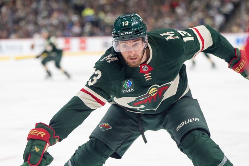 Nov 14, 2024; Saint Paul, Minnesota, USA; Minnesota Wild center Yakov Trenin (13) on the forecheck against the Montreal Canadiens in the second period at Xcel Energy Center. Mandatory Credit: Matt Blewett-Imagn Images