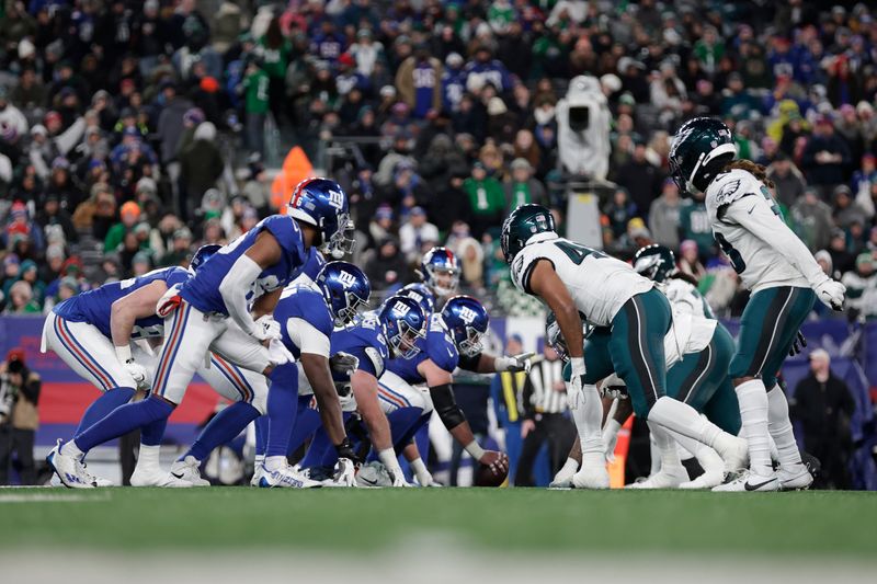 The New York Giants and the Philadelphia Eagles face off at the line of scrimmage during the second half of an NFL football game, Sunday, Jan. 7, 2024, in East Rutherford, N.J. (AP Photo/Adam Hunger)