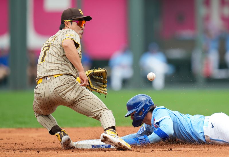 Jun 1, 2024; Kansas City, Missouri, USA; Kansas City Royals shortstop Bobby Witt Jr. (7) steals second base against San Diego Padres shortstop Ha-Seong Kim (7) during the first inning at Kauffman Stadium. Mandatory Credit: Jay Biggerstaff-USA TODAY Sports