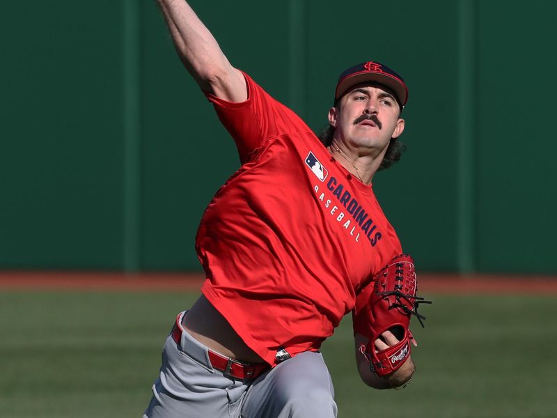 Apr 7, 2025; Pittsburgh, Pennsylvania, USA;  St. Louis Cardinals relief pitcher Ryan Fernandez (64) throws in the outfield before the game against the Pittsburgh Pirates at PNC Park. Mandatory Credit: Charles LeClaire-Imagn Images