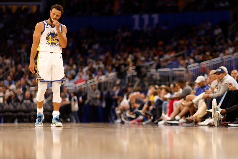 ORLANDO, FLORIDA - NOVEMBER 03: Stephen Curry #30 of the Golden State Warriors looks on during a game against the Golden State Warriors at Amway Center on November 03, 2022 in Orlando, Florida. NOTE TO USER: User expressly acknowledges and agrees that, by downloading and or using this photograph, User is consenting to the terms and conditions of the Getty Images License Agreement. (Photo by Mike Ehrmann/Getty Images)