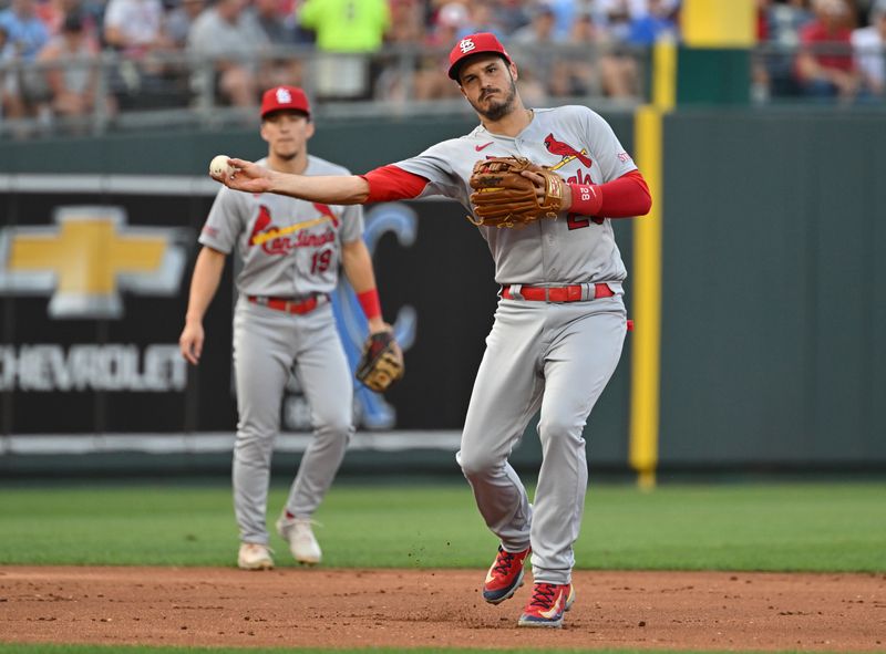 Aug 12, 2023; Kansas City, Missouri, USA;  St. Louis Cardinals second baseman Nolan Arenado (28) throws to first base for an out in the third inning against the Kansas City Royals at Kauffman Stadium. Mandatory Credit: Peter Aiken-USA TODAY Sports