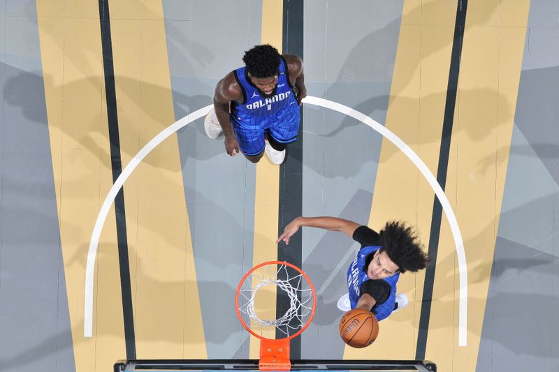 ORLANDO, FL - NOVEMBER 15: Anthony Black #0 of the Orlando Magic shoots the ball during the game against the Philadelphia 76ers during the Emirates NBA Cup game on  November 15, 2024 at Kia Center in Orlando, Florida. NOTE TO USER: User expressly acknowledges and agrees that, by downloading and or using this photograph, User is consenting to the terms and conditions of the Getty Images License Agreement. Mandatory Copyright Notice: Copyright 2024 NBAE (Photo by Fernando Medina/NBAE via Getty Images)