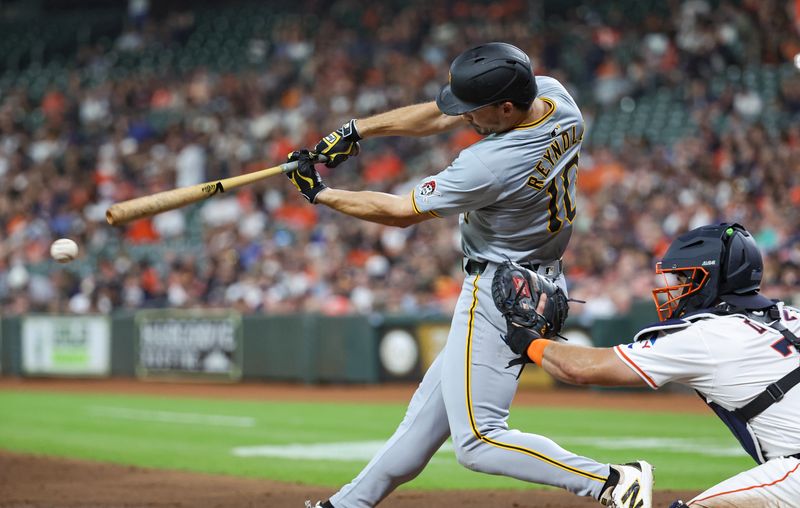 Jul 30, 2024; Houston, Texas, USA; Pittsburgh Pirates left fielder Bryan Reynolds (10) hits a single during the third inning against the Houston Astros at Minute Maid Park. Mandatory Credit: Troy Taormina-USA TODAY Sports
