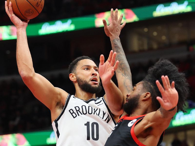 CHICAGO, ILLINOIS - NOVEMBER 03: Ben Simmons #10 of the Brooklyn Nets shoots over Coby White #0 of the Chicago Bulls in the second half of the NBA In-Season Tournament at the United Center on November 03, 2023 in Chicago, Illinois. NOTE TO USER: User expressly acknowledges and agrees that, by downloading and or using this photograph, User is consenting to the terms and conditions of the Getty Images License Agreement. (Photo by Michael Reaves/Getty Images)