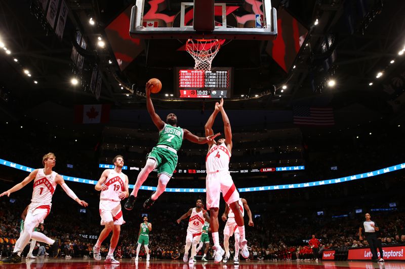 TORONTO, CANADA - OCTOBER 15: Jaylen Brown #7 of the Boston Celtics drives to the basket during the game against the Toronto Raptors on October 15, 2024 at the Scotiabank Arena in Toronto, Ontario, Canada.  NOTE TO USER: User expressly acknowledges and agrees that, by downloading and or using this Photograph, user is consenting to the terms and conditions of the Getty Images License Agreement.  Mandatory Copyright Notice: Copyright 2024 NBAE (Photo by Vaughn Ridley/NBAE via Getty Images)