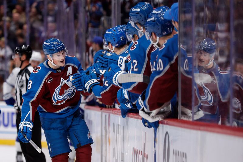 Oct 30, 2024; Denver, Colorado, USA; Colorado Avalanche defenseman Cale Makar (8) reacts with the bench after his goal in the third period against the Tampa Bay Lightning at Ball Arena. Mandatory Credit: Isaiah J. Downing-Imagn Images