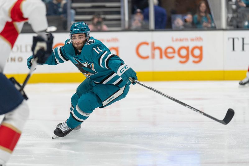 Nov 14, 2023; San Jose, California, USA; San Jose Sharks center Luke Kunin (11) during the second period against the Florida Panthers at SAP Center at San Jose. Mandatory Credit: Stan Szeto-USA TODAY Sports