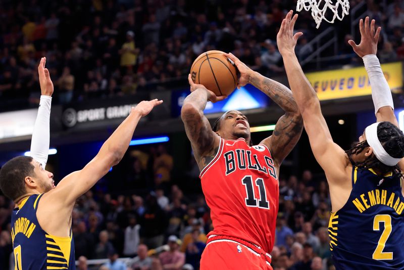 INDIANAPOLIS, INDIANA - MARCH 13: DeMar DeRozan #11 of the Chicago Bulls takes a shot over Andrew Nembhard #2 of the Indiana Pacers during the second half at Gainbridge Fieldhouse on March 13, 2024 in Indianapolis, Indiana. NOTE TO USER: User expressly acknowledges and agrees that, by downloading and or using this photograph, User is consenting to the terms and conditions of the Getty Images License Agreement. (Photo by Justin Casterline/Getty Images)