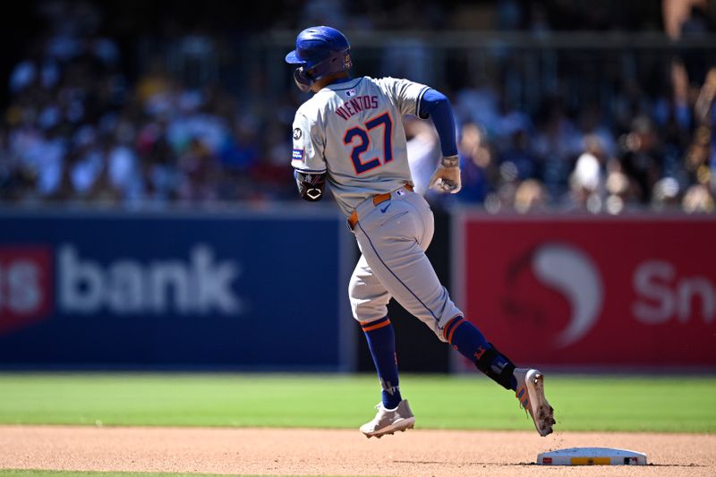 Aug 25, 2024; San Diego, California, USA; New York Mets third baseman Mark Vientos (27) rounds the bases after hitting a home run against the San Diego Padres during the seventh inning at Petco Park. Mandatory Credit: Orlando Ramirez-USA TODAY Sports