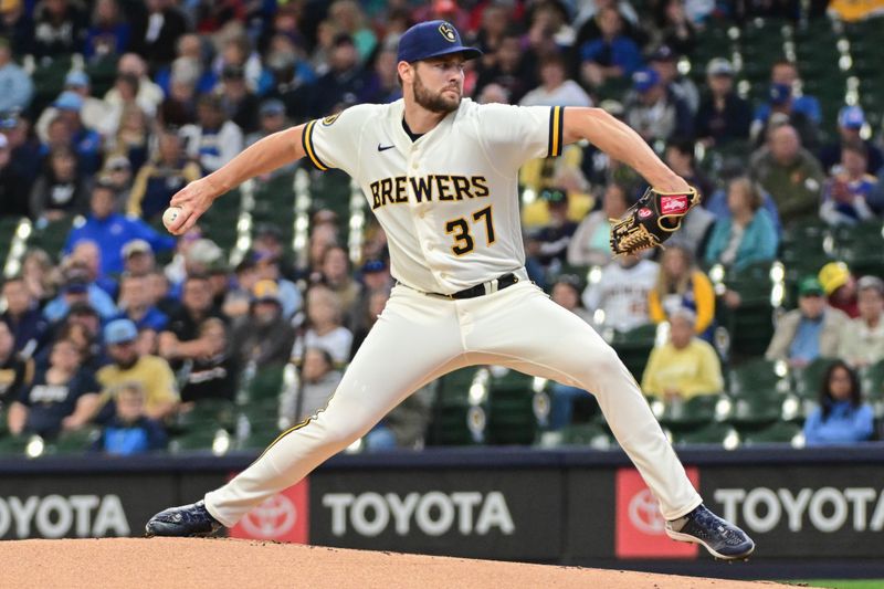 May 24, 2023; Milwaukee, Wisconsin, USA; Milwaukee Brewers pitcher Adrian Houser (37) pitches against the Houston Astros in the first inning at American Family Field. Mandatory Credit: Benny Sieu-USA TODAY Sports