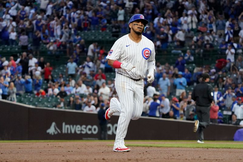 Aug 6, 2024; Chicago, Illinois, USA; Chicago Cubs third base Isaac Paredes (17) runs the bases after hitting a three-run home run against the Minnesota Twins during the first inning at Wrigley Field. Mandatory Credit: David Banks-USA TODAY Sports