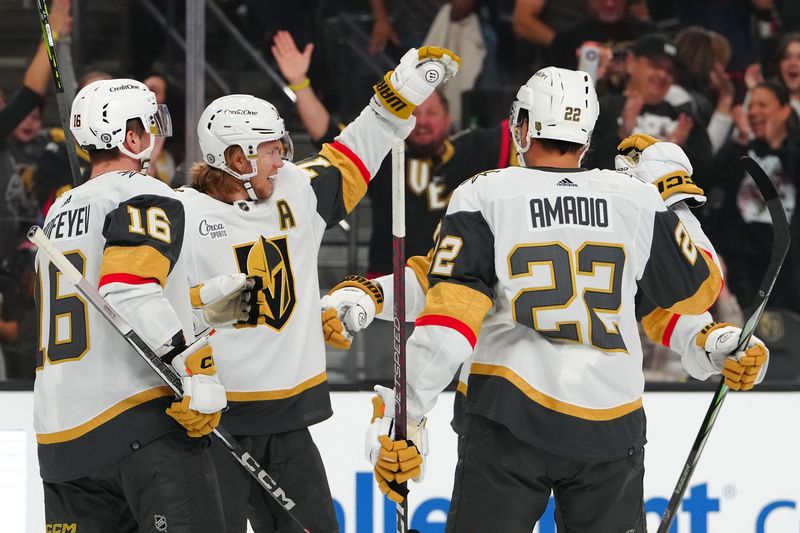 Oct 27, 2023; Las Vegas, Nevada, USA; Vegas Golden Knights center William Karlsson (71) celebrates with team mates after scoring a goal against the Chicago Blackhawks during the first period at T-Mobile Arena. Mandatory Credit: Stephen R. Sylvanie-USA TODAY Sports