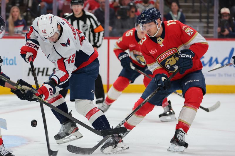 Nov 13, 2025; Sunrise, Florida, USA; Florida Panthers center Sam Reinhart (13) scores against the Washington Capitals during the second period at Amerant Bank Arena. Mandatory Credit: Sam Navarro-Imagn Images