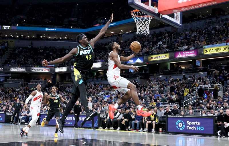 INDIANAPOLIS, INDIANA - FEBRUARY 26:   Immanuel Quickley #5 of the Toronto Raptors shoots the while defended by  Pascal Siakam #43 oft he Indiana Pacers at Gainbridge Fieldhouse on February 26, 2024 in Indianapolis, Indiana.    NOTE TO USER: User expressly acknowledges and agrees that, by downloading and or using this photograph, User is consenting to the terms and conditions of the Getty Images License Agreement.  (Photo by Andy Lyons/Getty Images)