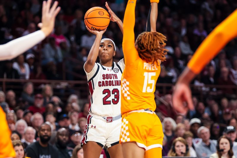 Mar 3, 2024; Columbia, South Carolina, USA; South Carolina Gamecocks guard Bree Hall (23) shoots over Tennessee Lady Vols guard Jasmine Powell (15) in the first half at Colonial Life Arena. Mandatory Credit: Jeff Blake-USA TODAY Sports