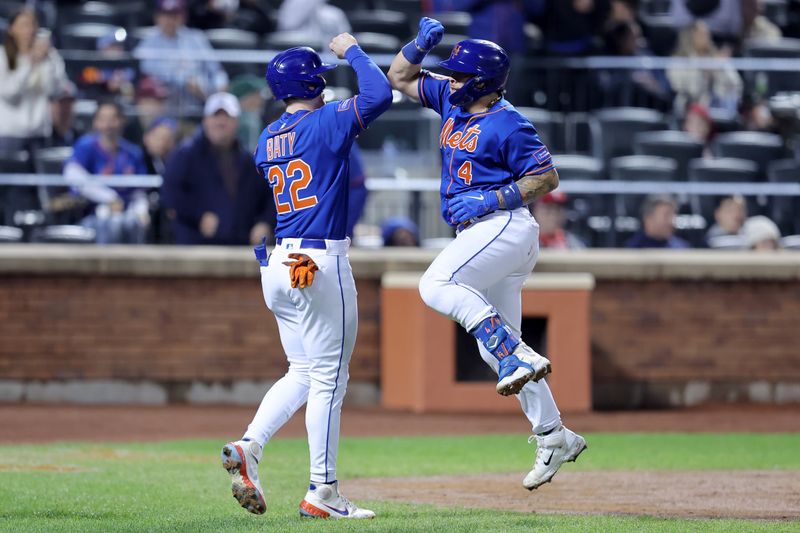 Sep 30, 2023; New York City, New York, USA; New York Mets catcher Francisco Alvarez (4) celebrates his two run home run against the Philadelphia Phillies with third baseman Brett Baty (22) during the second inning at Citi Field. Mandatory Credit: Brad Penner-USA TODAY Sports