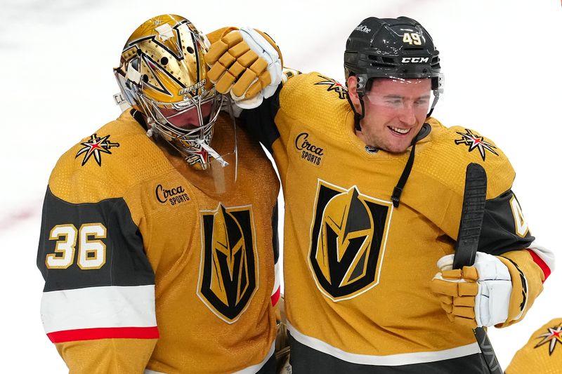 Dec 2, 2023; Las Vegas, Nevada, USA; Vegas Golden Knights center Ivan Barbashev (49) congratulates Vegas Golden Knights goaltender Logan Thompson (36) after the Golden Knights defeated the Washington Capitals 4-1 at T-Mobile Arena. Mandatory Credit: Stephen R. Sylvanie-USA TODAY Sports