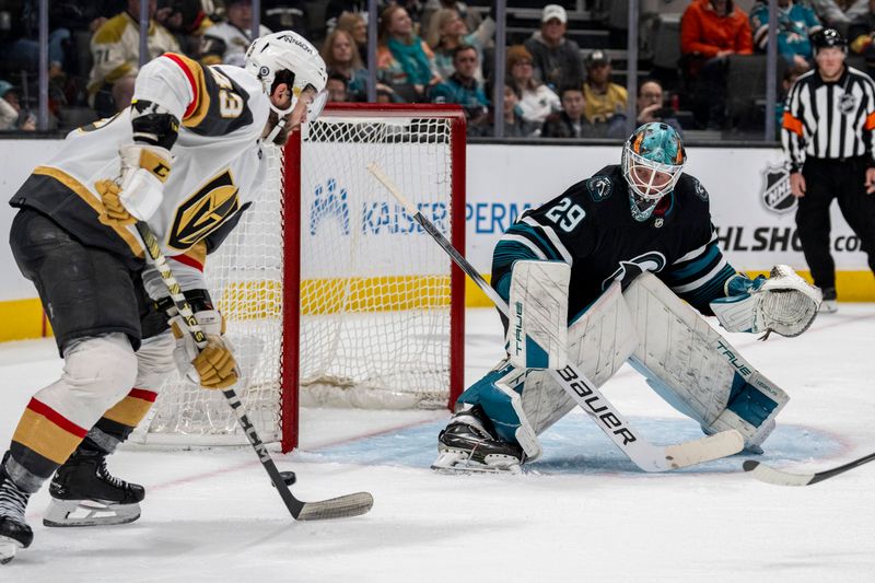 Feb 19, 2024; San Jose, California, USA; Vegas Golden Knights center Paul Cotter (43) misses the pass in front of the net against San Jose Sharks goalie Mackenzie Blackwood (29) during the third period at SAP Center at San Jose. Mandatory Credit: Neville E. Guard-USA TODAY Sports