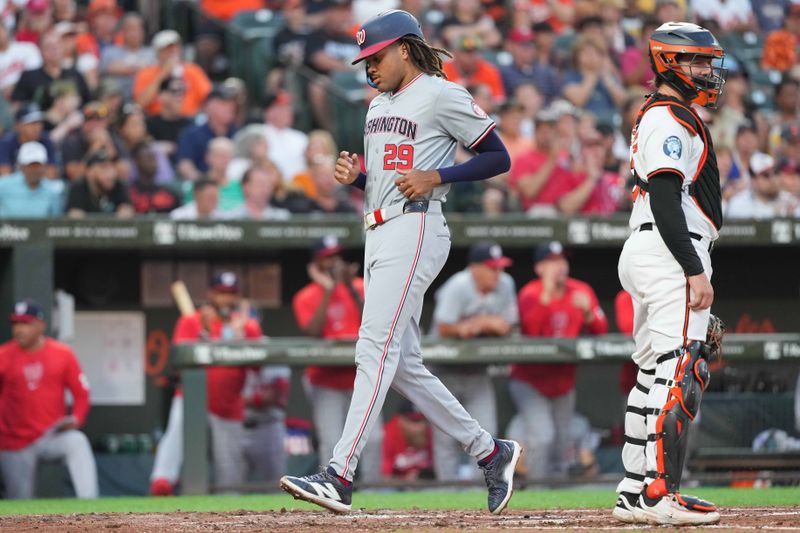 Aug 13, 2024; Baltimore, Maryland, USA; Washington Nationals outfielder James Wood (29) scores in the fourth inning against the Baltimore Orioles at Oriole Park at Camden Yards. Mandatory Credit: Mitch Stringer-USA TODAY Sports