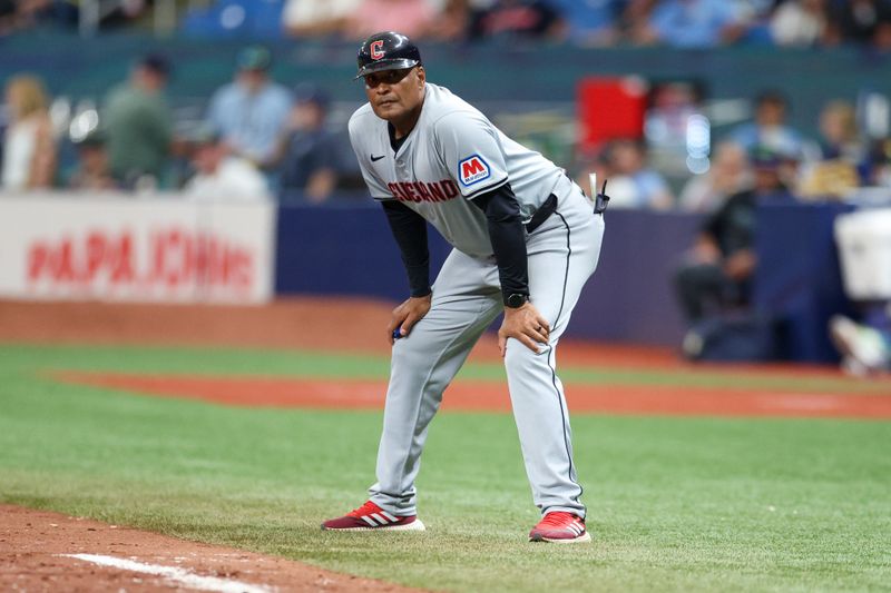 Jul 13, 2024; St. Petersburg, Florida, USA; Cleveland Guardians first base and catching coach Sandy Alomar Jr. (15) looks on against the Tampa Bay Rays in the seventh inning at Tropicana Field. Mandatory Credit: Nathan Ray Seebeck-USA TODAY Sports