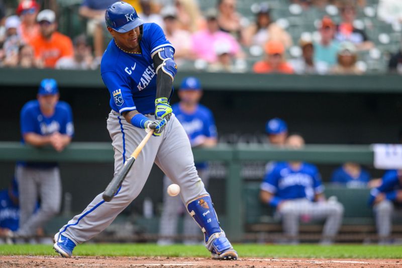 Jun 11, 2023; Baltimore, Maryland, USA; Kansas City Royals catcher Salvador Perez (13) hits a double during the first inning against the Baltimore Orioles at Oriole Park at Camden Yards. Mandatory Credit: Reggie Hildred-USA TODAY Sports