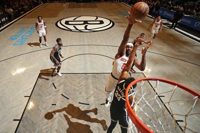BROOKLYN, NY - JANUARY 23: Precious Achiuwa #5 of the New York Knicks shoots the ball during the game against the Brooklyn Nets on January 23, 2024 at Barclays Center in Brooklyn, New York. NOTE TO USER: User expressly acknowledges and agrees that, by downloading and or using this Photograph, user is consenting to the terms and conditions of the Getty Images License Agreement. Mandatory Copyright Notice: Copyright 2024 NBAE (Photo by Nathaniel S. Butler/NBAE via Getty Images)