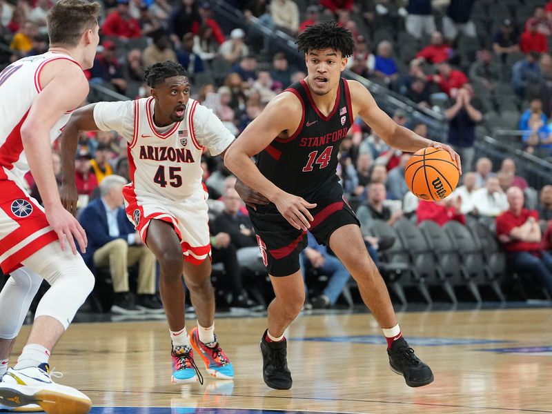Mar 9, 2023; Las Vegas, NV, USA; Stanford Cardinal forward Spencer Jones (14) dribbles against Arizona Wildcats guard Cedric Henderson Jr. (45) during the first half at T-Mobile Arena. Mandatory Credit: Stephen R. Sylvanie-USA TODAY Sports