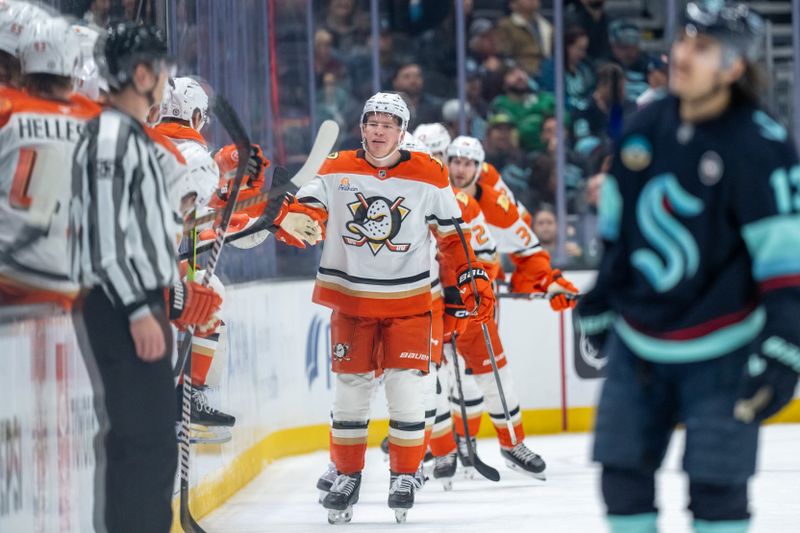 Jan 28, 2025; Seattle, Washington, USA;  Anaheim Ducks defenseman Jackson LaCombe (2) celebrates after scoring a goal during the second period against the Seattle Kraken at Climate Pledge Arena. Mandatory Credit: Stephen Brashear-Imagn Images