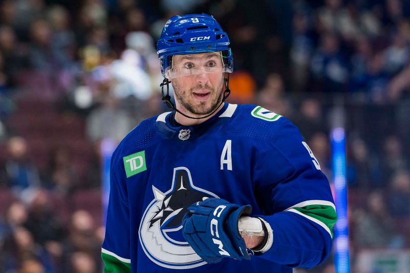 Apr 6, 2023; Vancouver, British Columbia, CAN; Vancouver Canucks forward J.T. Miller (9) during a stop in play against the Chicago Blackhawks in the second period at Rogers Arena. Mandatory Credit: Bob Frid-USA TODAY Sports