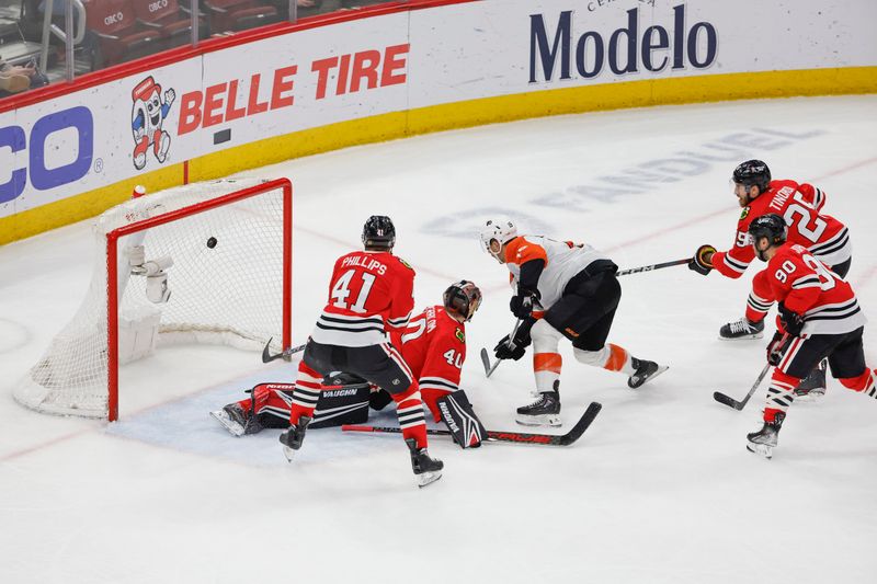 Feb 21, 2024; Chicago, Illinois, USA; Philadelphia Flyers right wing Garnet Hathaway (19) scores against the Chicago Blackhawks during the second period at United Center. Mandatory Credit: Kamil Krzaczynski-USA TODAY Sports