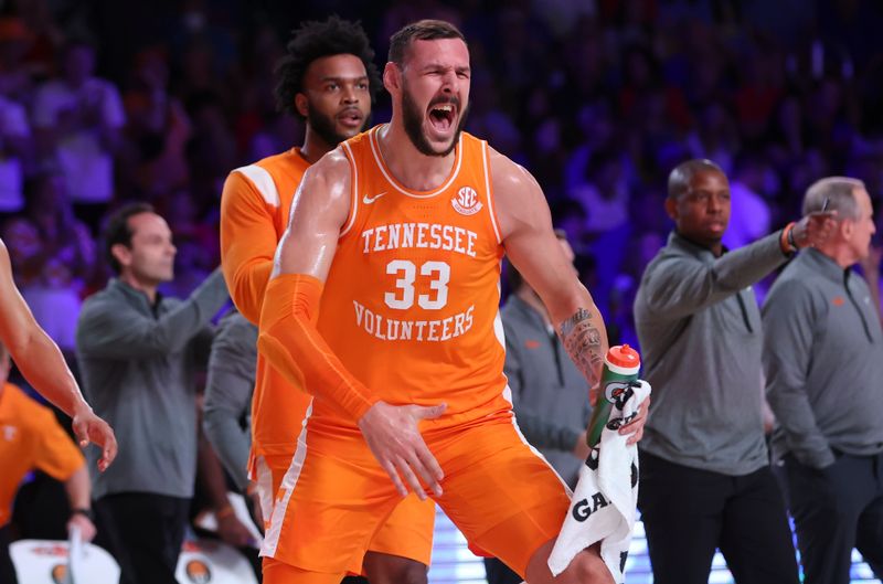 Nov 25, 2022; Paradise Island, BAHAMAS; Tennessee Volunteers forward Uros Plavsic (33) celebrates during the first half against the Kansas Jayhawks at Imperial Arena. Mandatory Credit: Kevin Jairaj-USA TODAY Sports