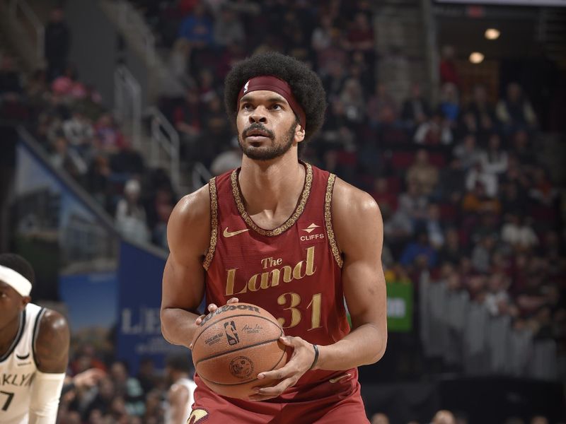 CLEVELAND, OH - MARCH 10: Jarrett Allen #31 of the Cleveland Cavaliers shoots a free throw during the game against the Brooklyn Nets on March 10, 2024 at Rocket Mortgage FieldHouse in Cleveland, Ohio. NOTE TO USER: User expressly acknowledges and agrees that, by downloading and/or using this Photograph, user is consenting to the terms and conditions of the Getty Images License Agreement. Mandatory Copyright Notice: Copyright 2024 NBAE (Photo by David Liam Kyle/NBAE via Getty Images)