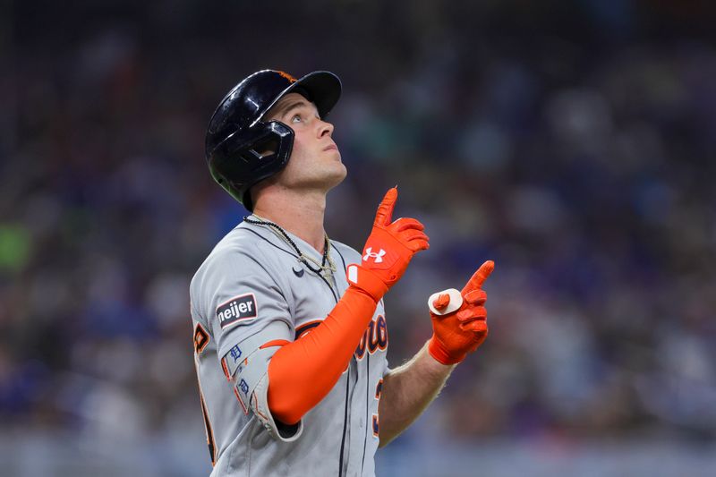 Jul 30, 2023; Miami, Florida, USA; Detroit Tigers right fielder Kerry Carpenter (30) reacts on his way to first base against the Miami Marlins during the second inning at loanDepot Park. Mandatory Credit: Sam Navarro-USA TODAY Sports