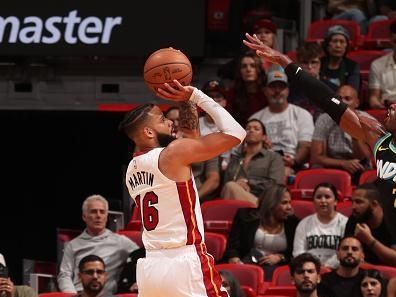 MIAMI, FL - DECEMBER 2: Caleb Martin #16 of the Miami Heat shoots the ball during the game against the Indiana Pacers on December 2, 2023 at Kaseya Center in Miami, Florida. NOTE TO USER: User expressly acknowledges and agrees that, by downloading and or using this Photograph, user is consenting to the terms and conditions of the Getty Images License Agreement. Mandatory Copyright Notice: Copyright 2023 NBAE (Photo by Issac Baldizon/NBAE via Getty Images)