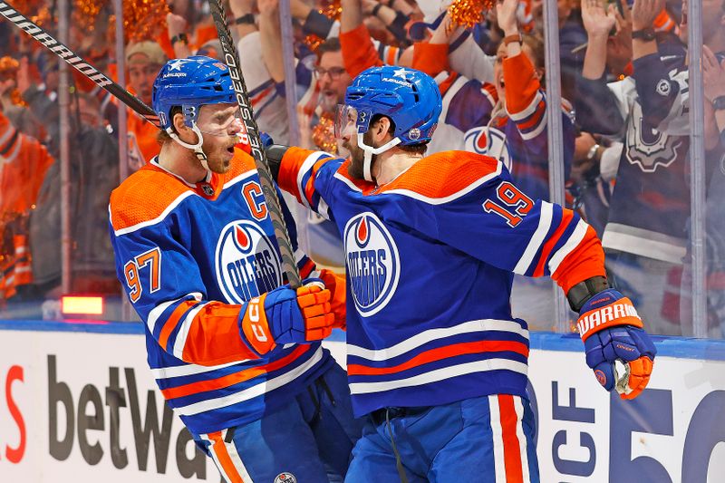 Apr 22, 2024; Edmonton, Alberta, CAN; Edmonton Oilers forward Adam Henrique (19) celebrates after scoring a goal during the first period against the Los Angeles Kings in game one of the first round of the 2024 Stanley Cup Playoffs at Rogers Place. Mandatory Credit: Perry Nelson-USA TODAY Sports