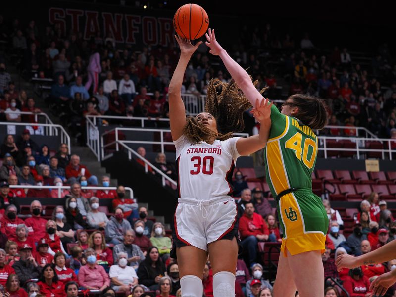 Jan 29, 2023; Stanford, California, USA; Stanford Cardinal guard Haley Jones (30) shoots the ball against Oregon Ducks forward Grace VanSlooten (40) during the third quarter at Maples Pavilion. Mandatory Credit: Kelley L Cox-USA TODAY Sports