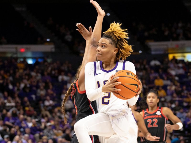 Feb 2, 2023; Baton Rouge, Louisiana, USA;  LSU Lady Tigers guard Jasmine Carson (2) drives to the basket against the Georgia Lady Bulldogs during the first half at Pete Maravich Assembly Center. Mandatory Credit: Stephen Lew-USA TODAY Sports