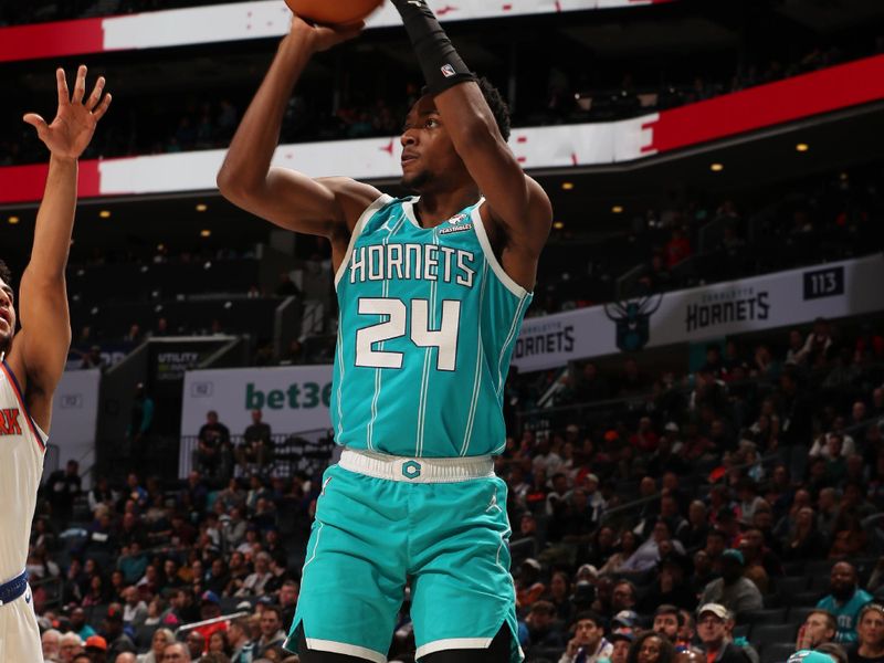 CHARLOTTE, NC - JANUARY 29: Brandon Miller #24 of the Charlotte Hornets shoots a three point basket during the game against the New York Knicks on January 29, 2024 at Spectrum Center in Charlotte, North Carolina. NOTE TO USER: User expressly acknowledges and agrees that, by downloading and or using this photograph, User is consenting to the terms and conditions of the Getty Images License Agreement. Mandatory Copyright Notice: Copyright 2024 NBAE (Photo by Kent Smith/NBAE via Getty Images)