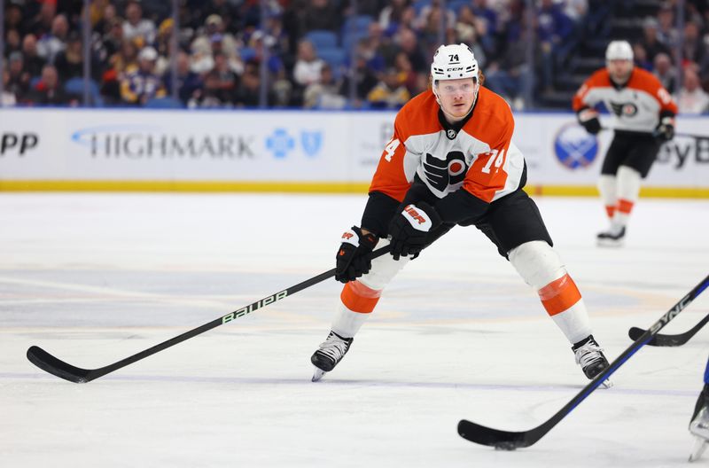 Apr 5, 2024; Buffalo, New York, USA;  Philadelphia Flyers right wing Owen Tippett (74) looks to block a pass during the first period against the Buffalo Sabres at KeyBank Center. Mandatory Credit: Timothy T. Ludwig-USA TODAY Sports