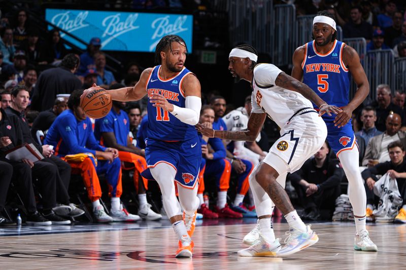 DENVER, CO - MARCH 21: Jalen Brunson #11 of the New York Knicks handles the ball during the game against the Denver Nuggets on March 21, 2024 at the Ball Arena in Denver, Colorado. NOTE TO USER: User expressly acknowledges and agrees that, by downloading and/or using this Photograph, user is consenting to the terms and conditions of the Getty Images License Agreement. Mandatory Copyright Notice: Copyright 2024 NBAE (Photo by Garrett Ellwood/NBAE via Getty Images)